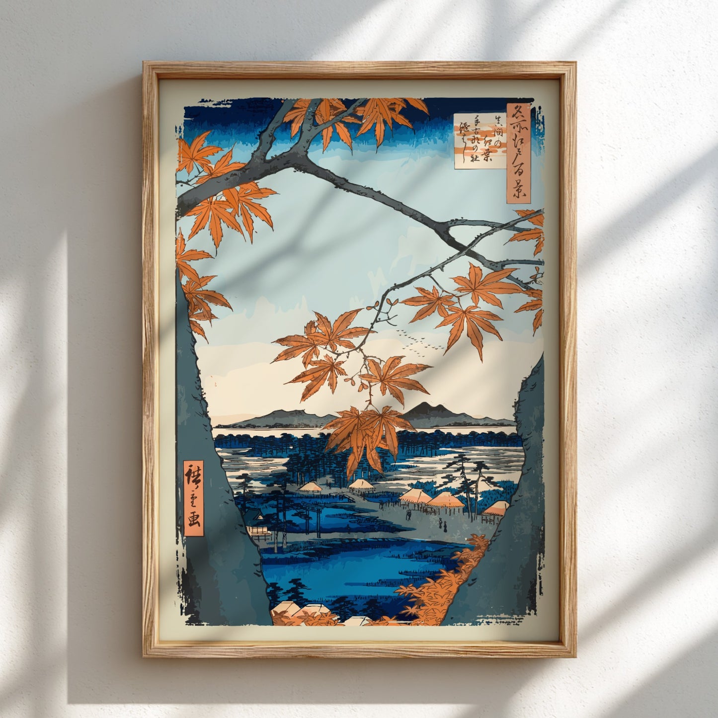 Japanese art poster of orange maple trees framing a serene landscape with water and mountains.
