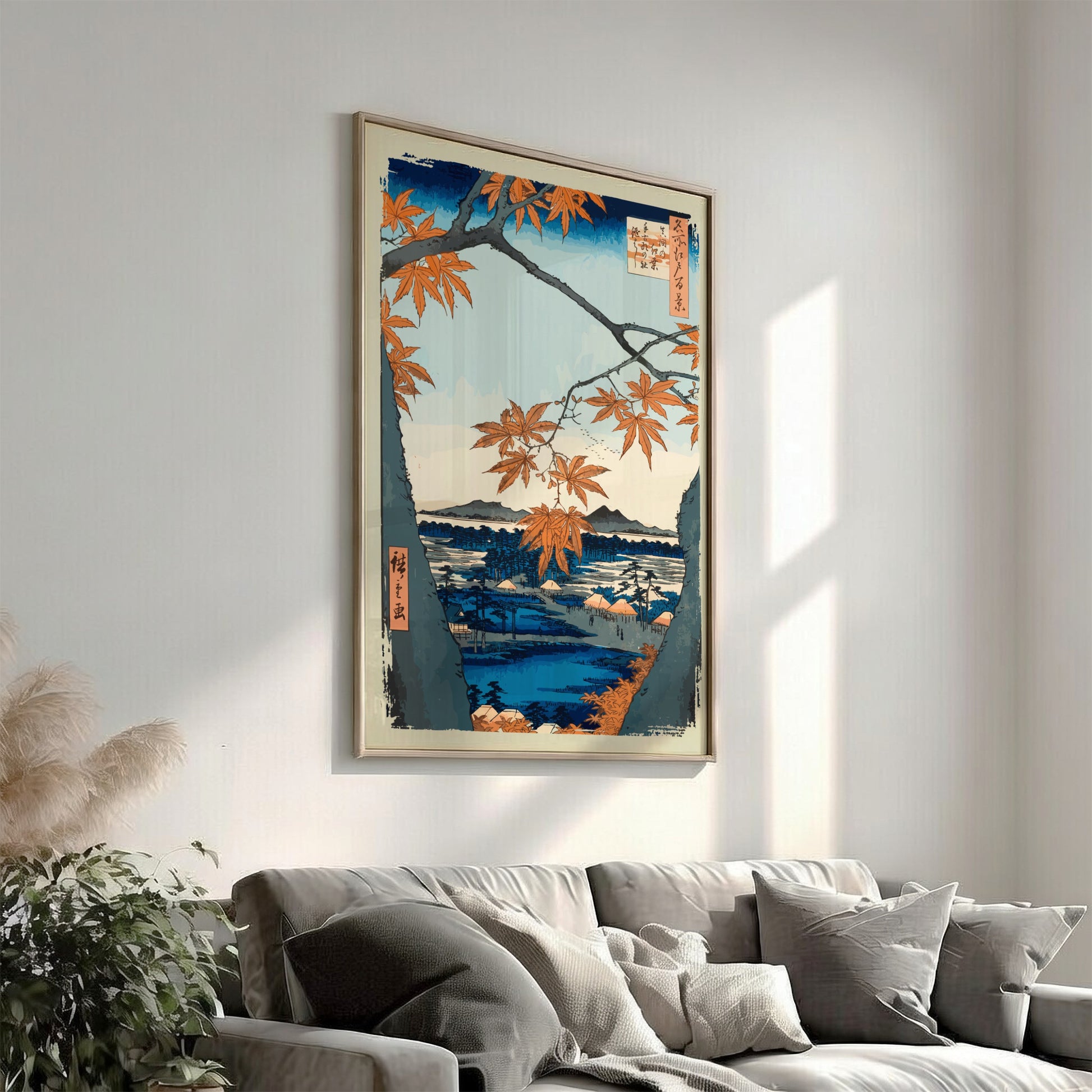 Japanese art poster of orange maple trees framing a serene landscape with water and mountains.