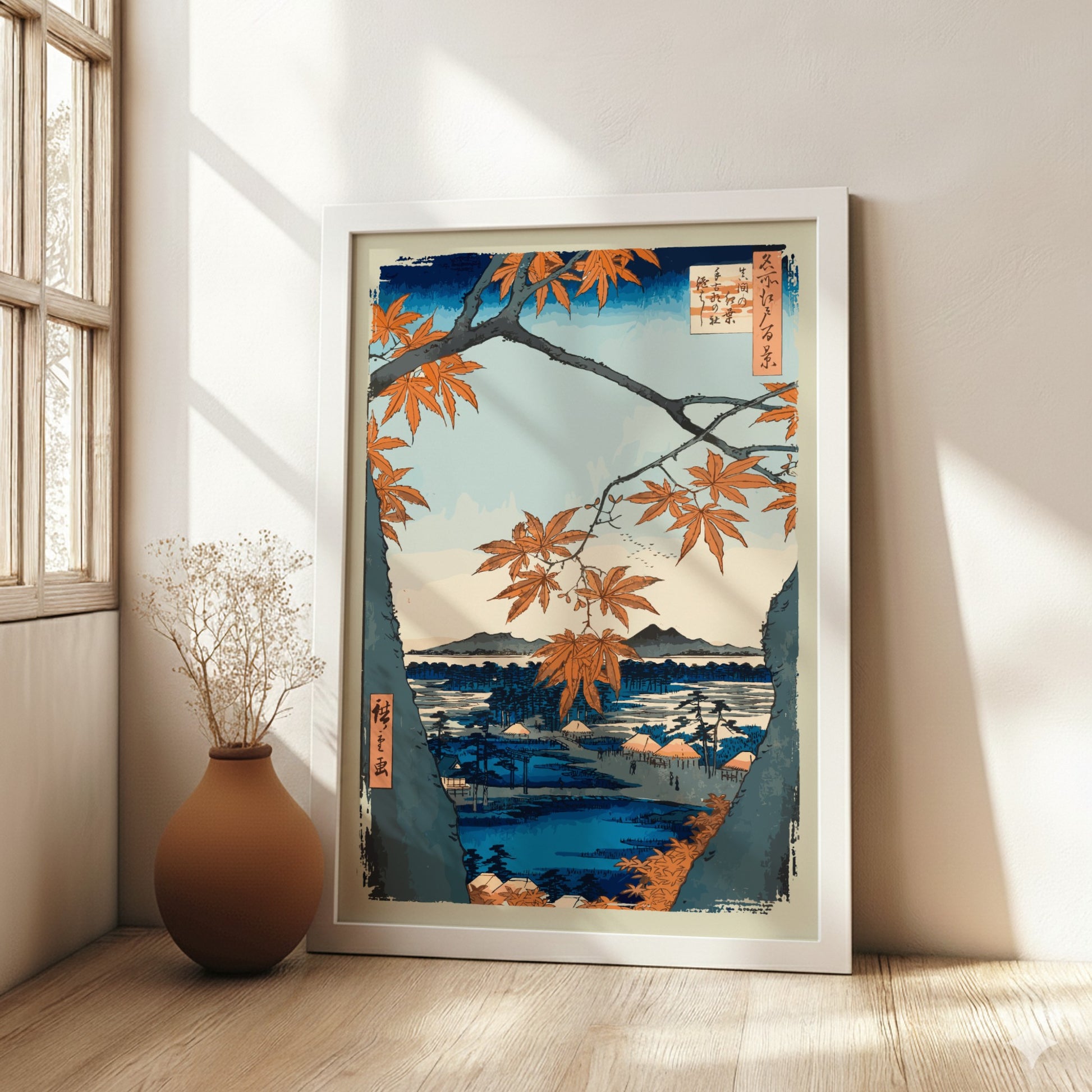 Japanese art poster of orange maple trees framing a serene landscape with water and mountains.