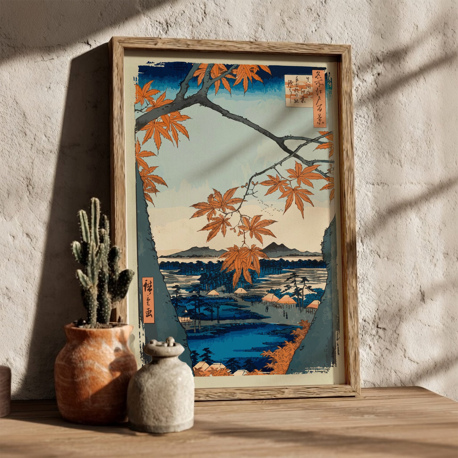 Japanese art poster of orange maple trees framing a serene landscape with water and mountains.