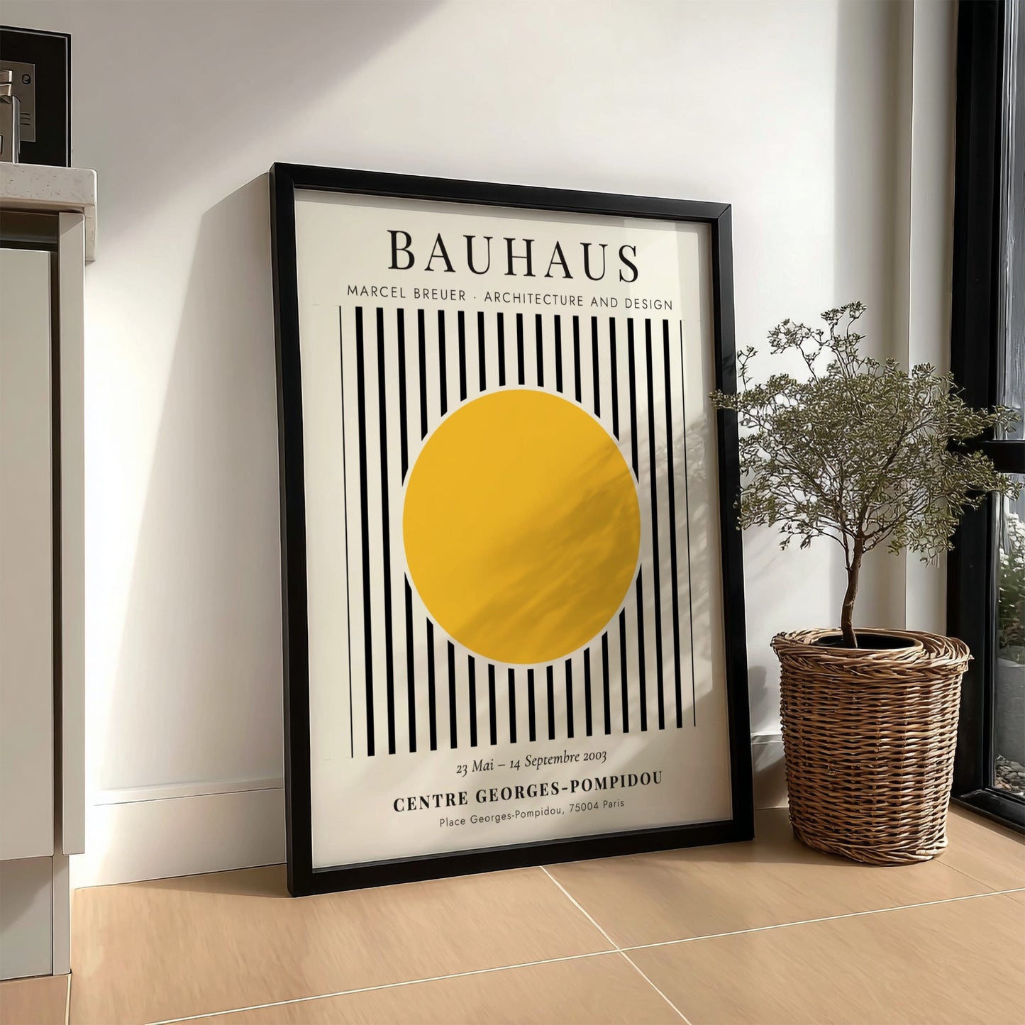 Bauhaus poster featuring Marcel Breuer's design with yellow circle and black stripes