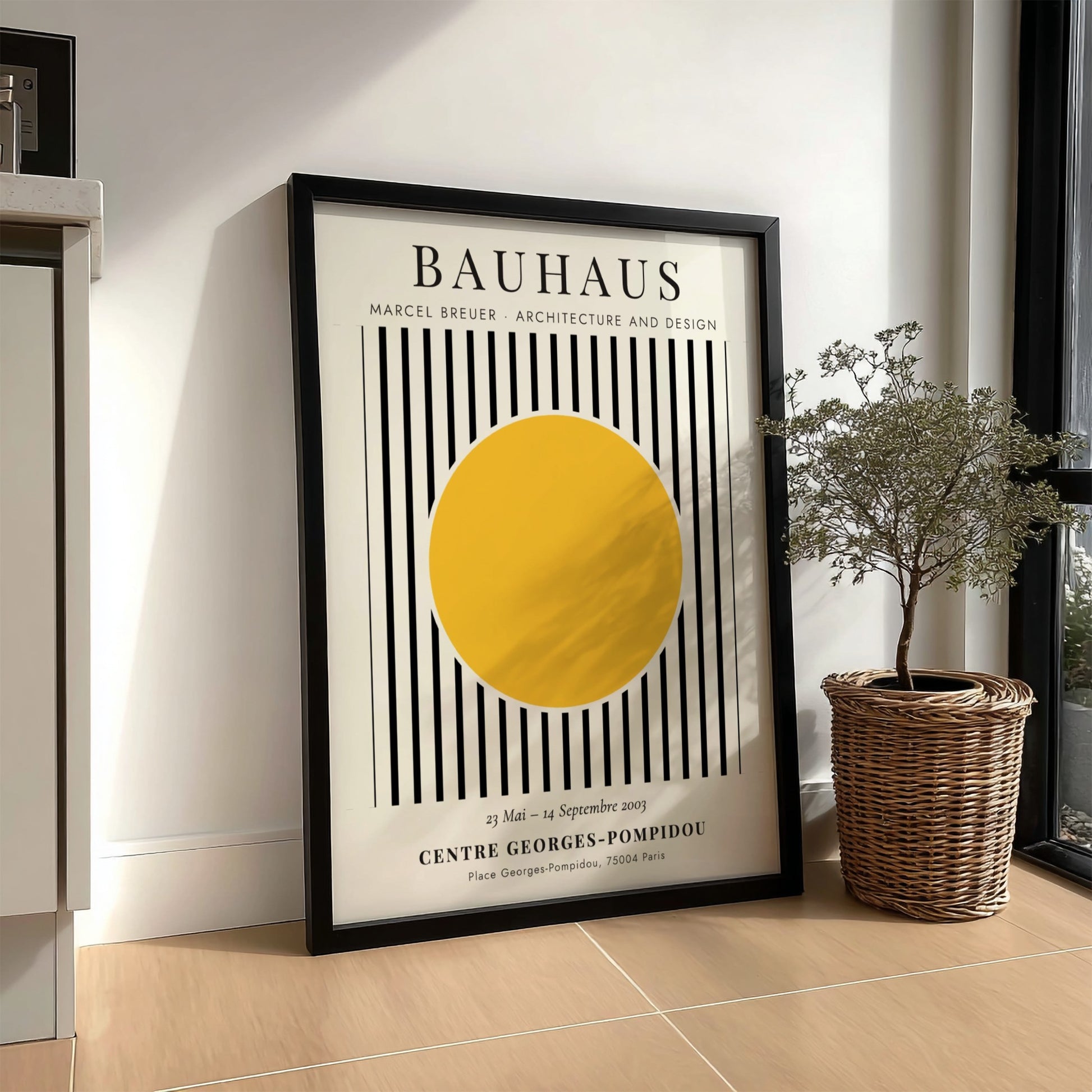 Bauhaus poster featuring Marcel Breuer's design with yellow circle and black stripes