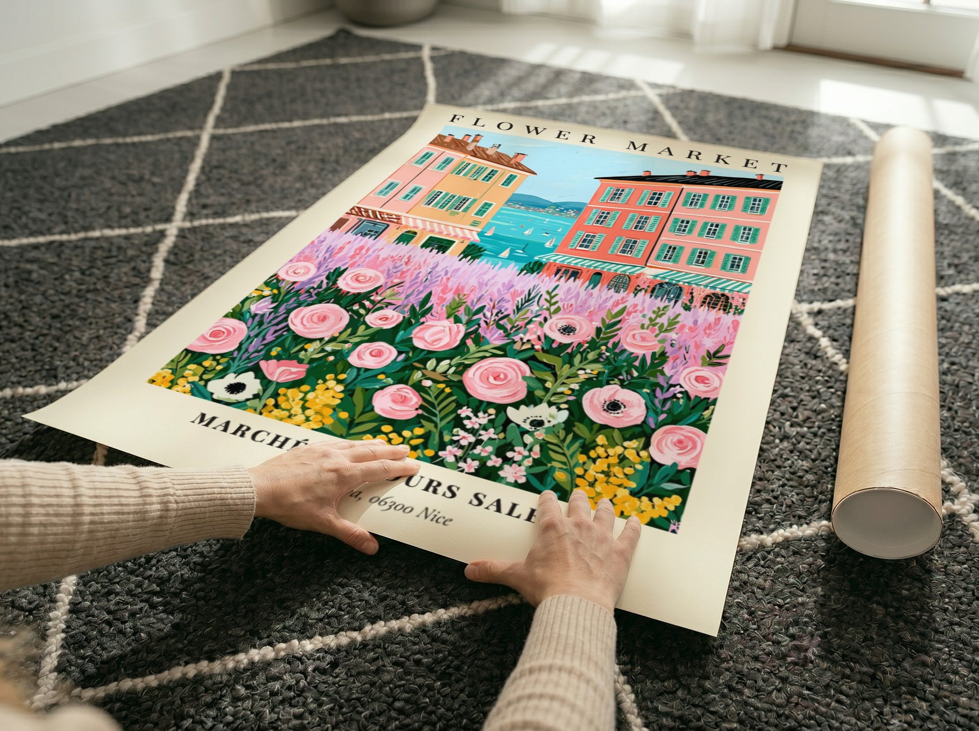 Flower market art print featuring pink flowers and colorful buildings by the sea in a whimsical style