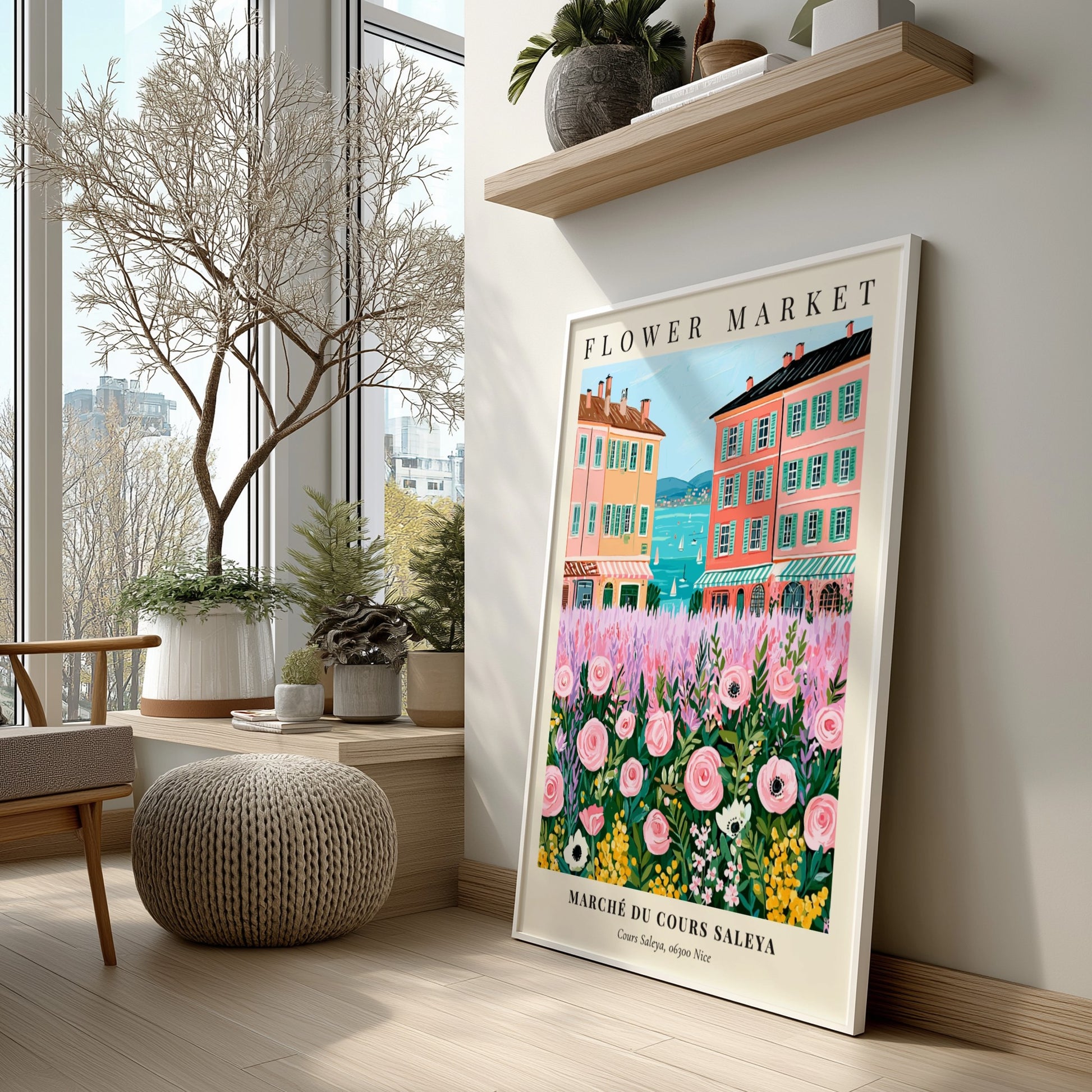 Flower market art print featuring pink flowers and colorful buildings by the sea in a whimsical style