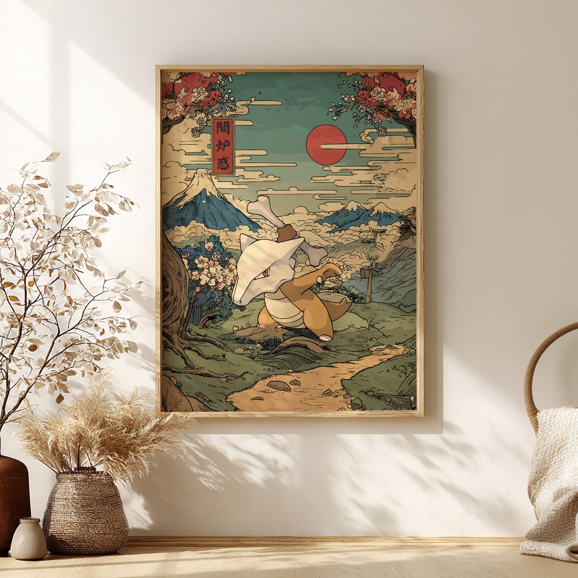 Framed artwork of Marowak Pokemon in a mountainous landscape with a red sun, displayed on a wall.