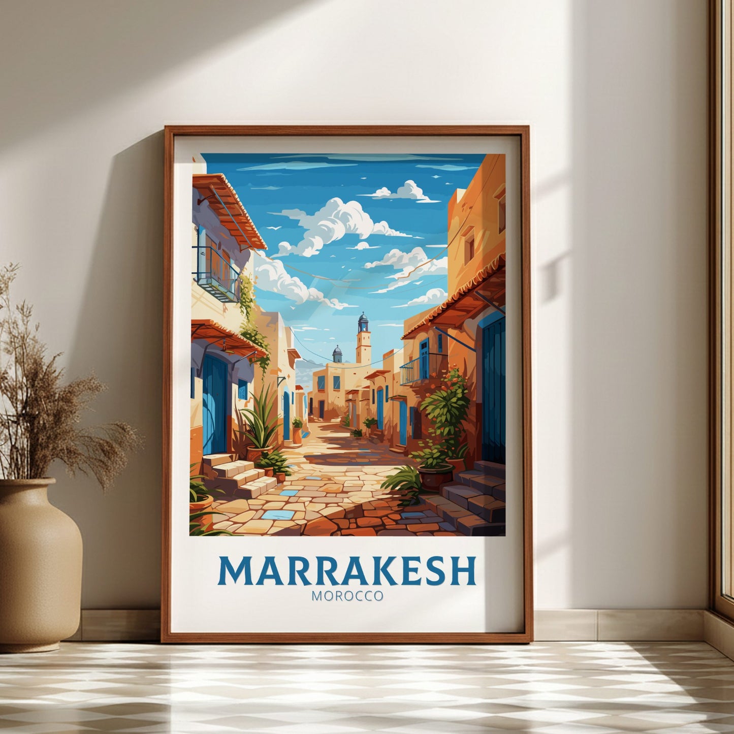 Framed artwork of a street scene in Marrakesh, Morocco, on a wall.