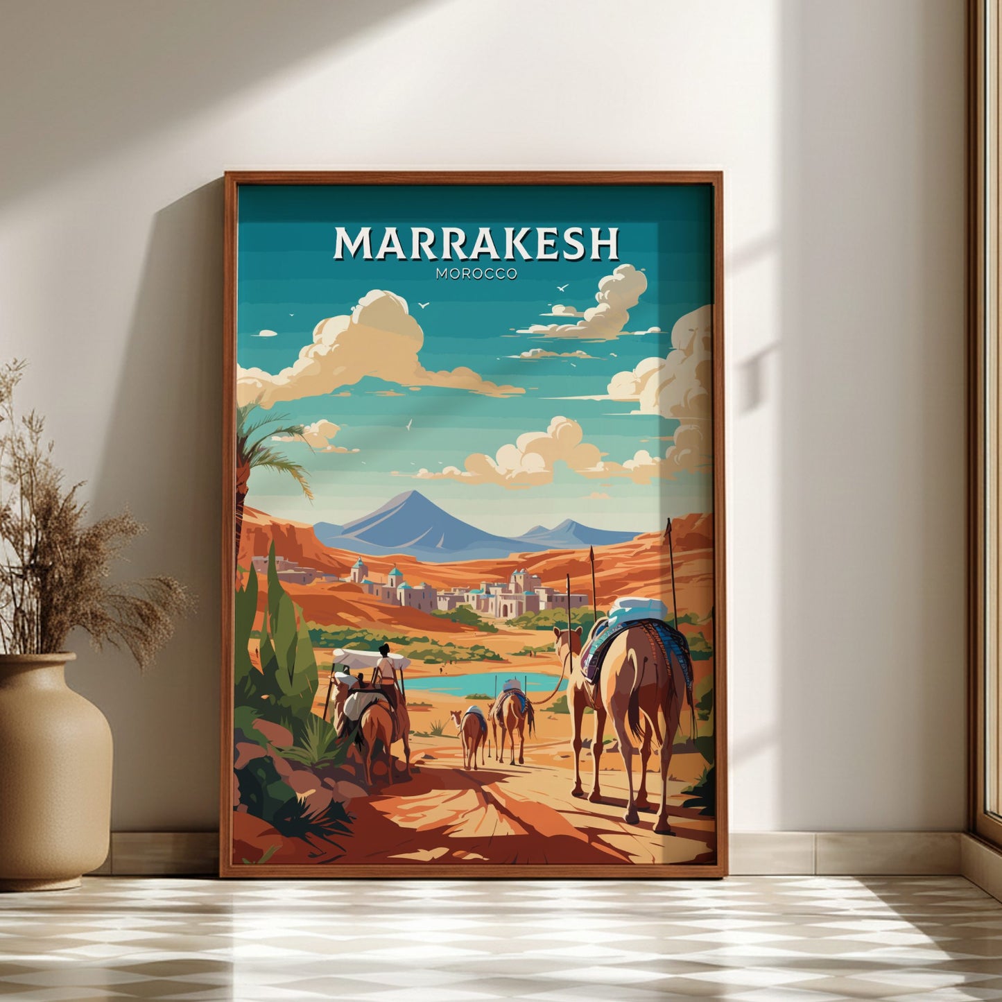Framed artwork of a desert scene with camels and mountains, labeled 'Marrakesh'.