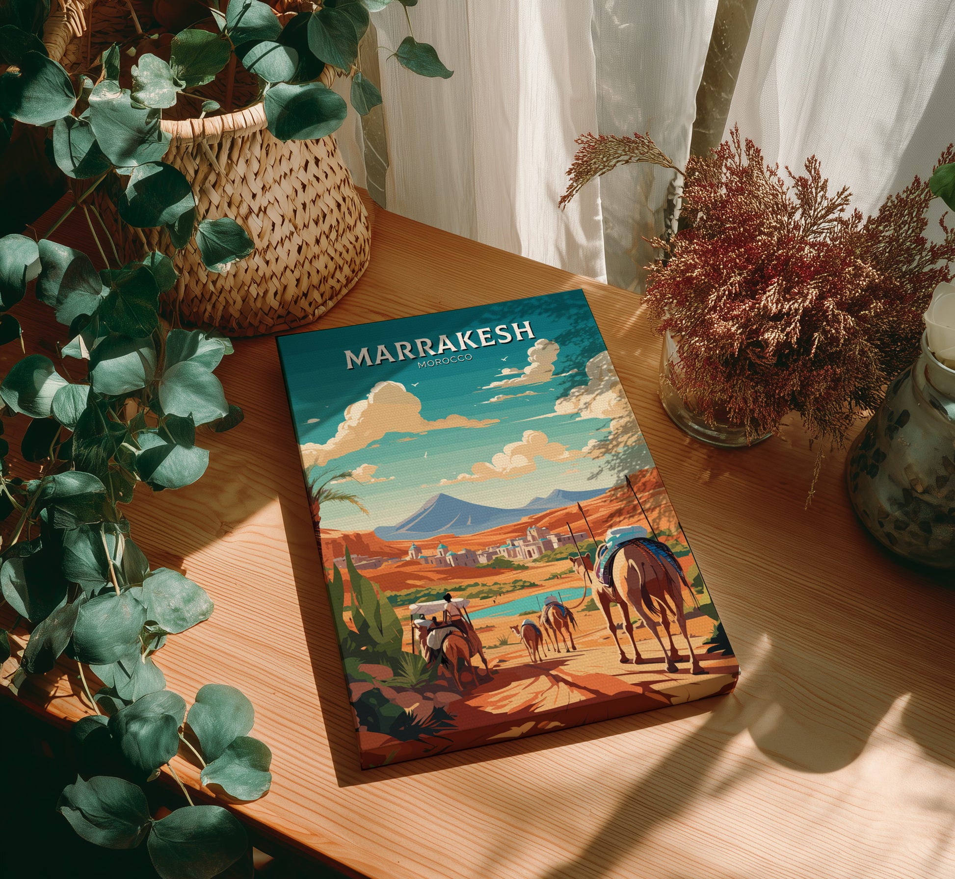 Book titled 'Marrakesh' on a wooden table with plants and decor.