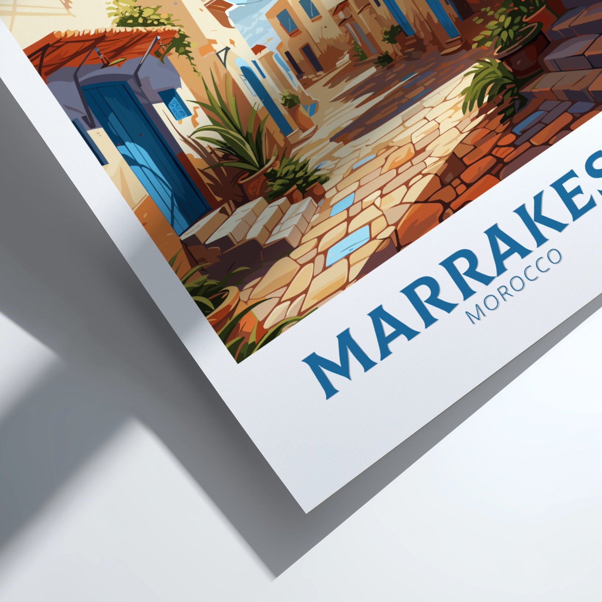 Framed artwork of a street scene in Marrakesh, Morocco with 'Marrakesh Morocco' text.
