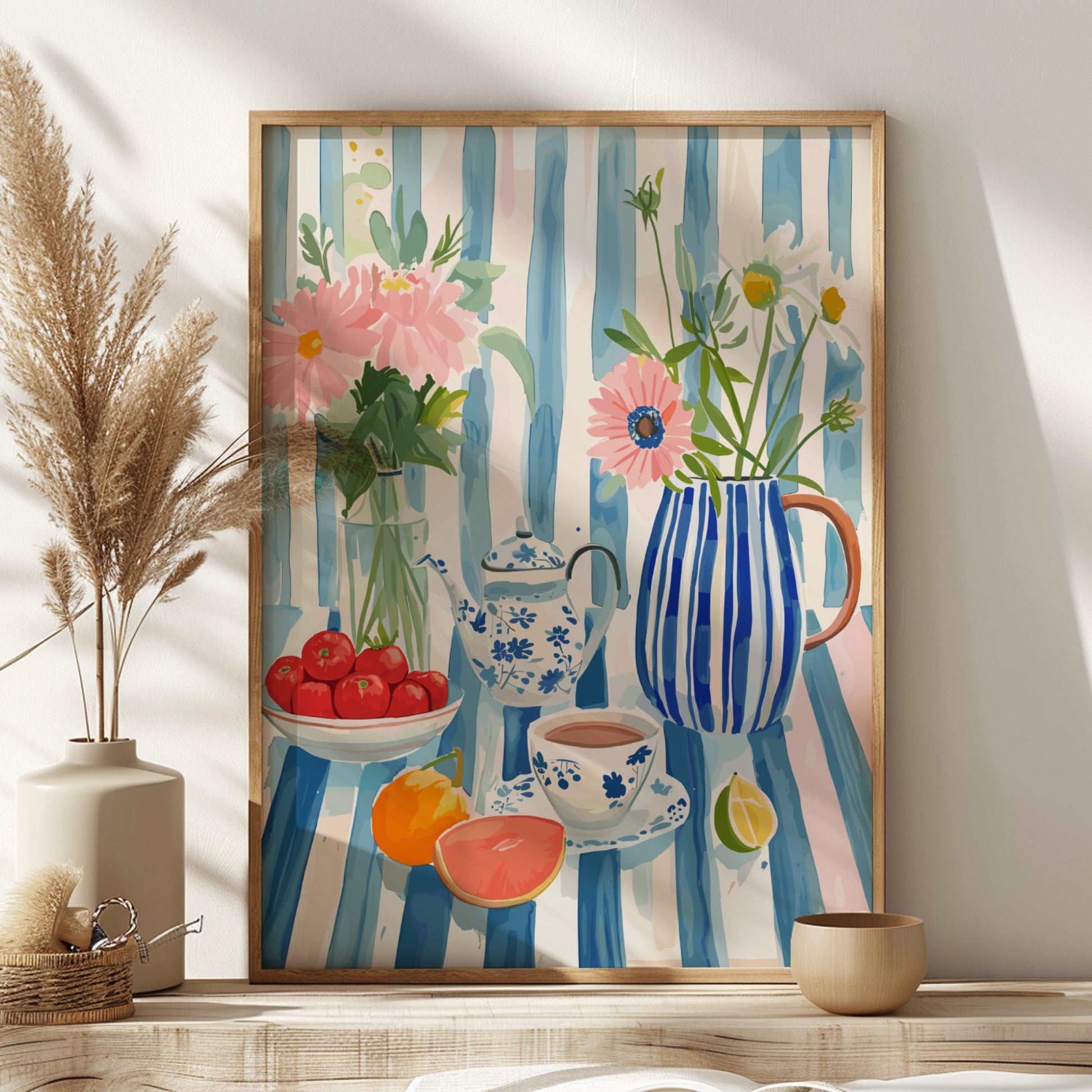 Framed artwork with floral and still life elements on a striped background, displayed on a shelf.