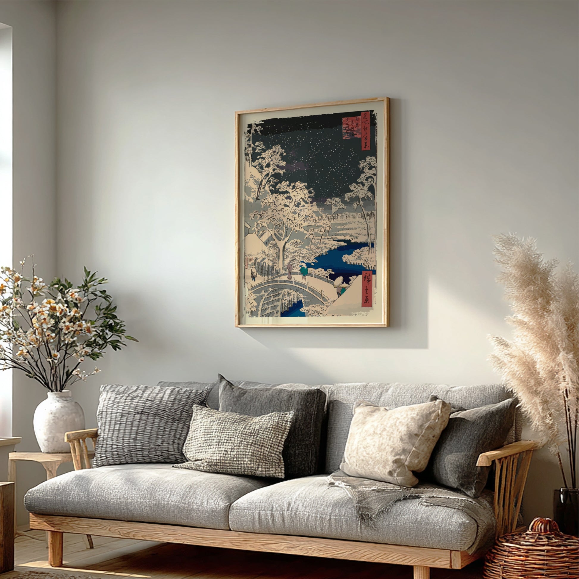 Japanese woodblock print poster of a snowy night scene with a bridge, trees, and stars.