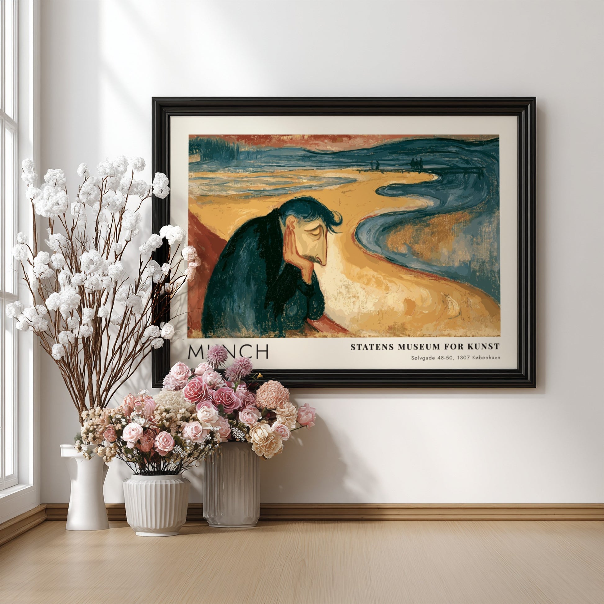 Framed Munch Melancholy exhibition print featuring a pensive man on a golden beach.