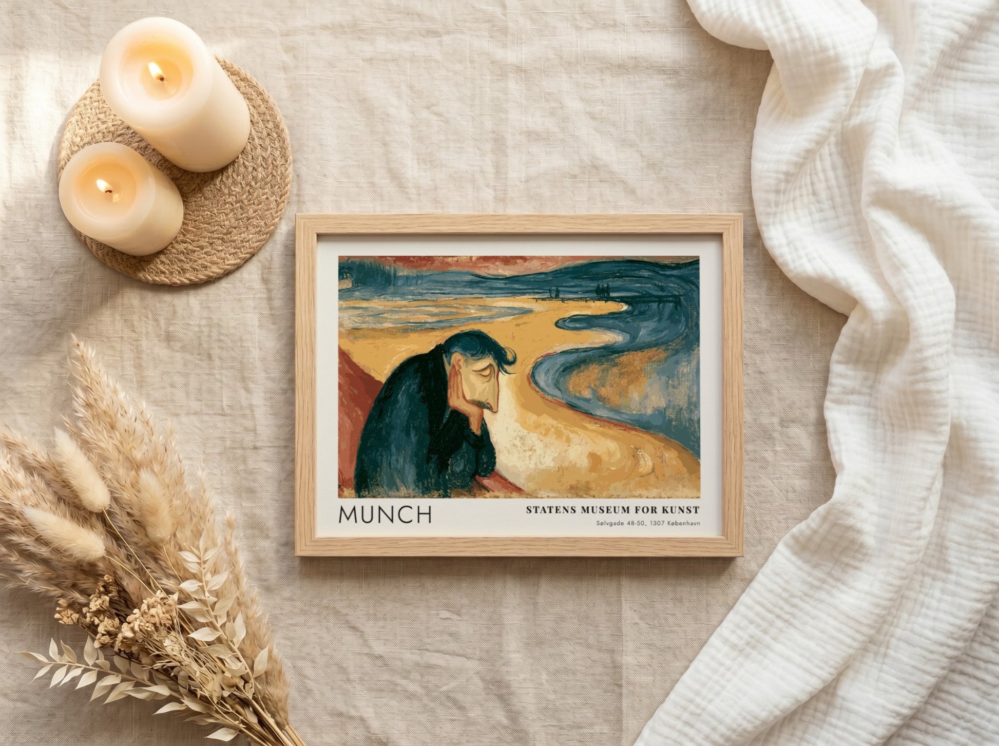 Framed Munch Melancholy exhibition print featuring a pensive man on a golden beach.