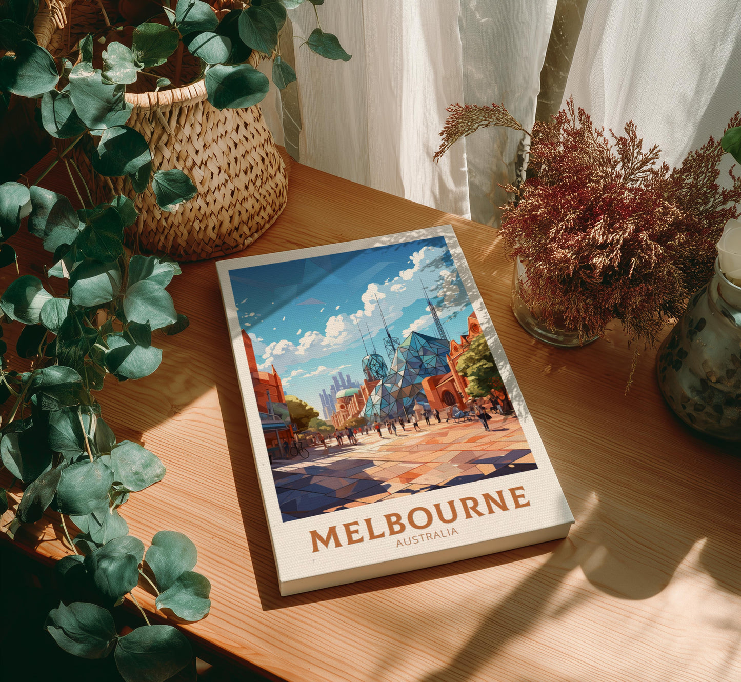 Canvas with a Melbourne illustration on a wooden table with plants