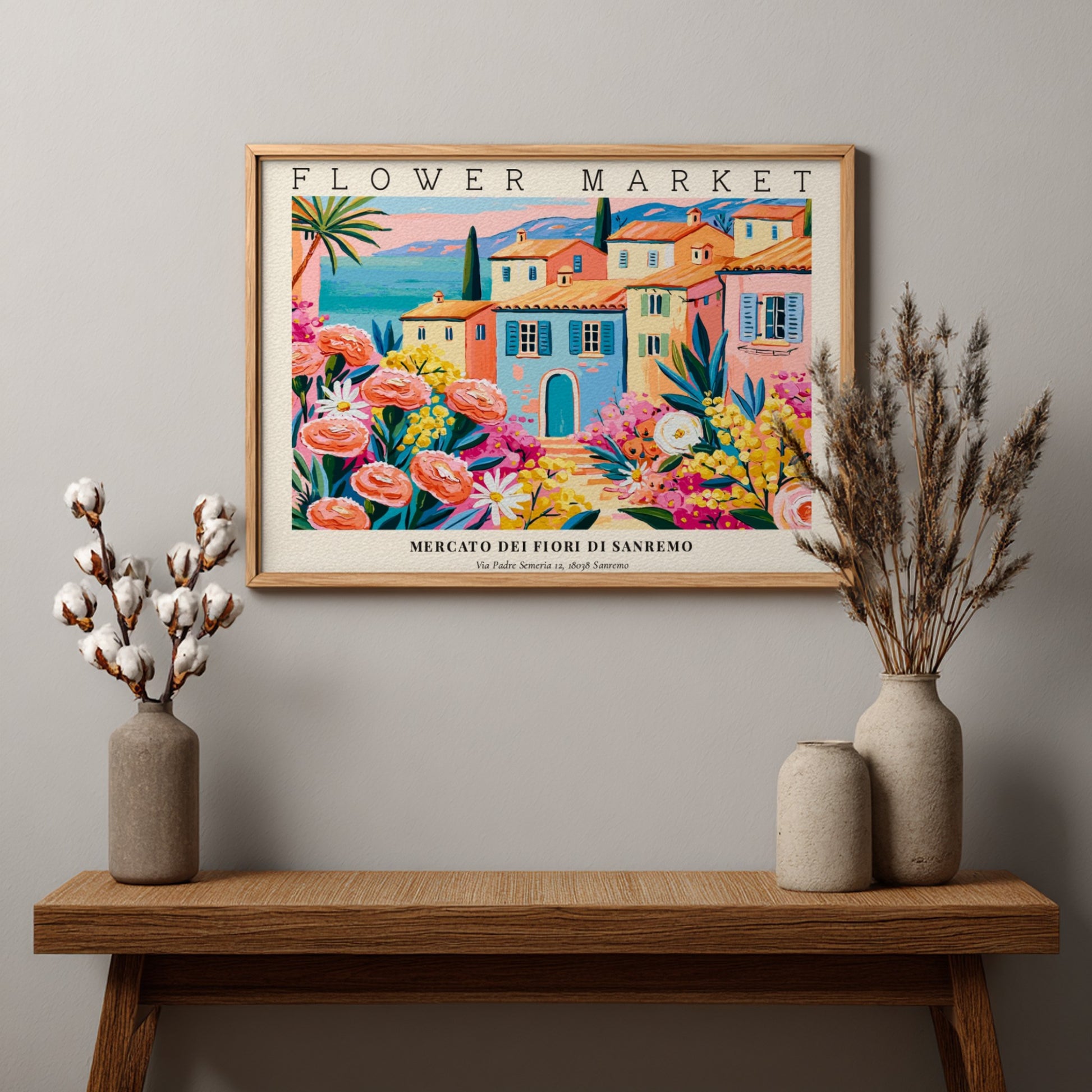 Flower market poster featuring vibrant pink roses and a coastal town scene in bright colors
