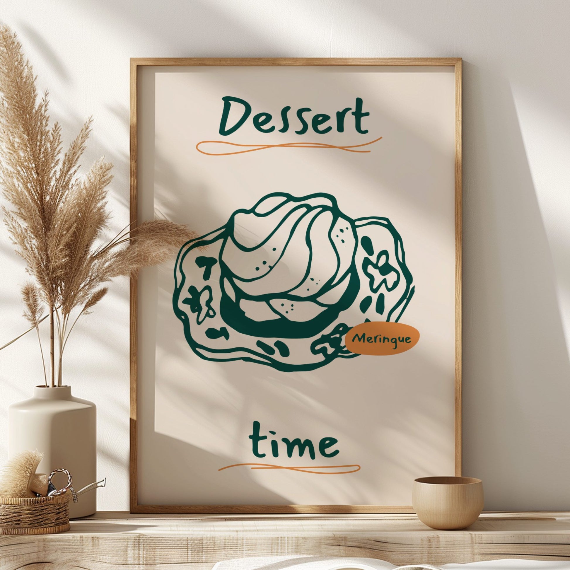 Framed artwork with a dessert illustration and text on a wall with decorative elements.