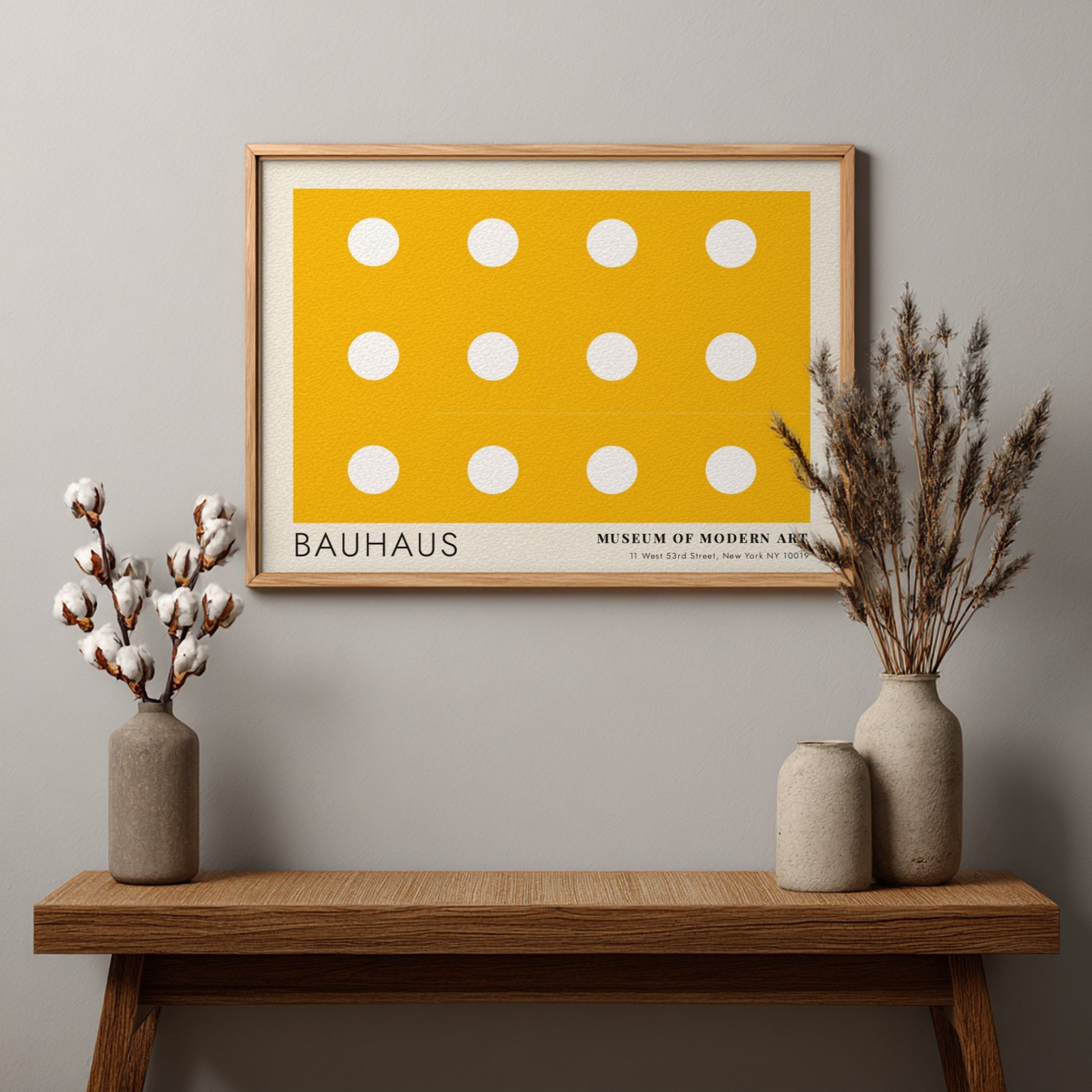 Wall art poster featuring a yellow background with white circles and Bauhaus typography.