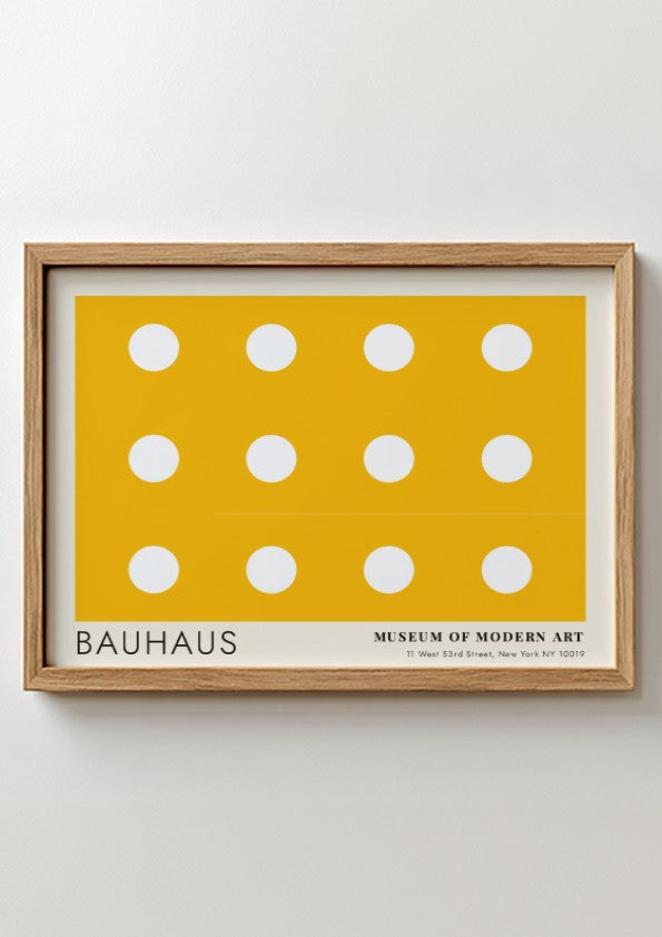 Wall art poster featuring a yellow background with white circles and Bauhaus typography.