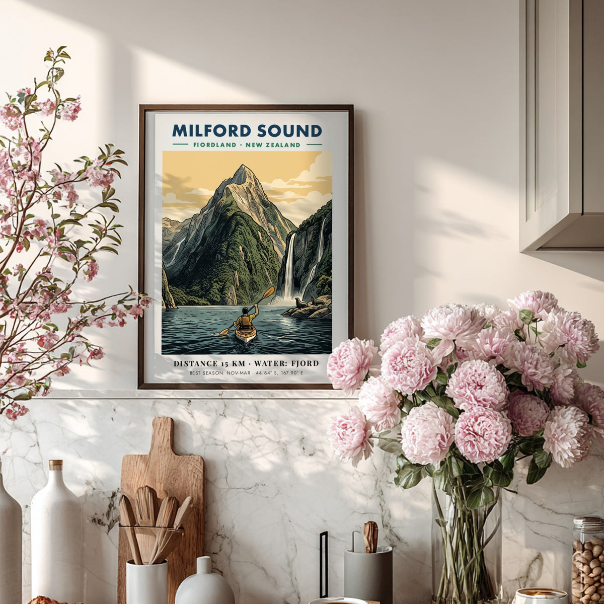 Milford Sound travel poster featuring a kayaker on blue water before green mountains.