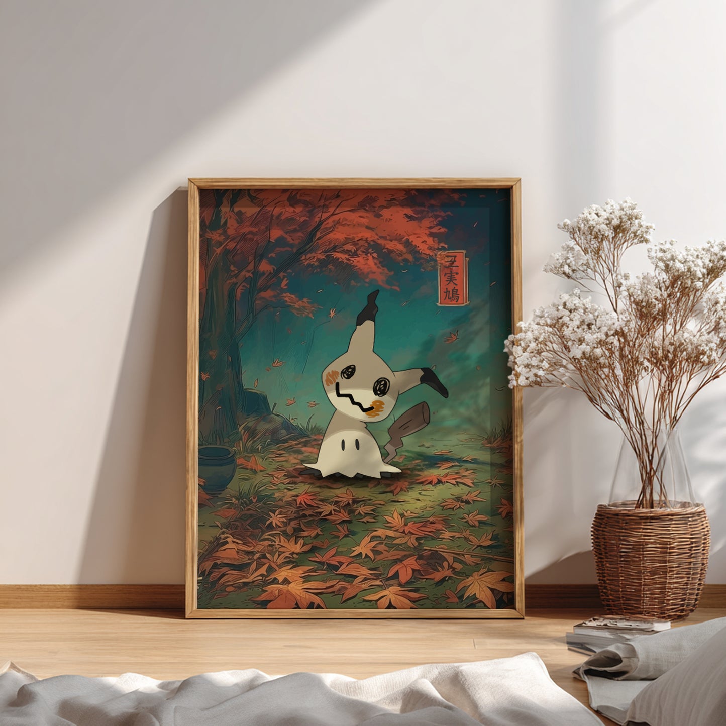 Framed artwork of Mimikyu Pokemon in a forest with autumn leaves on a wall.