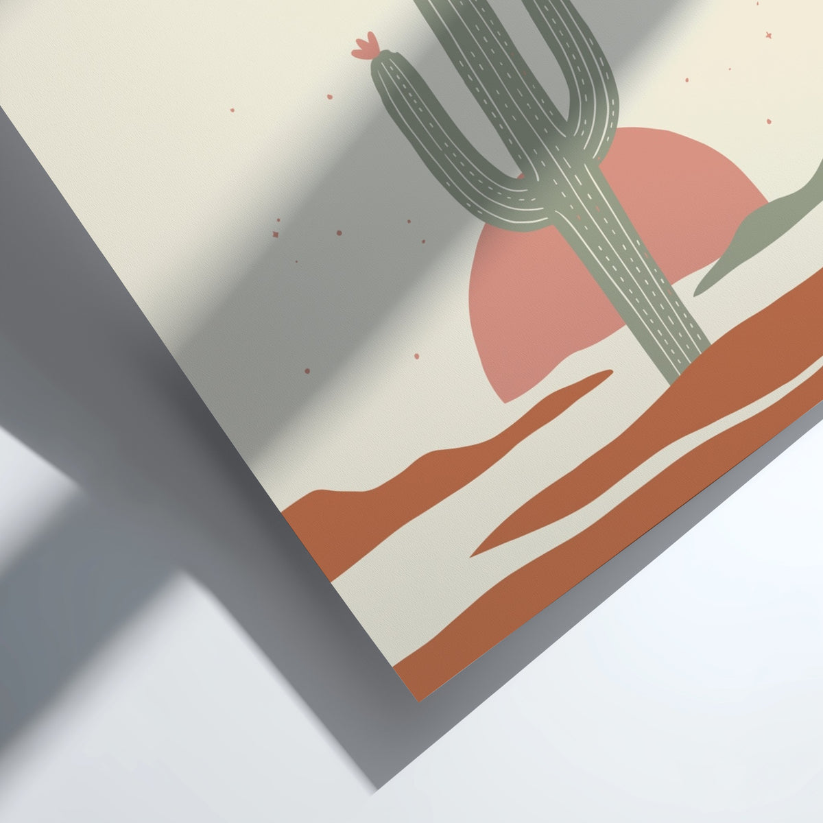 Poster featuring a minimalist green saguaro cactus set against a warm terracotta sun background