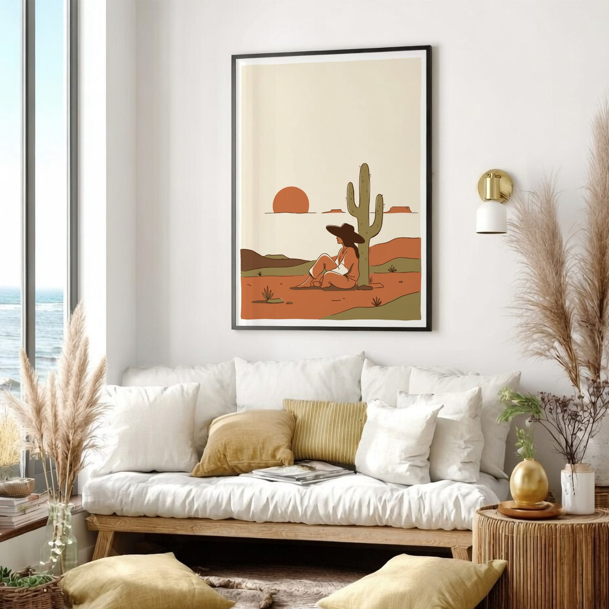 Poster of a woman sitting under a saguaro cactus during a desert sunset
