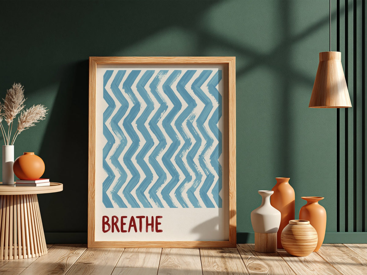 Motivational poster featuring blue hand-painted zigzag stripes above the word Breathe in red.