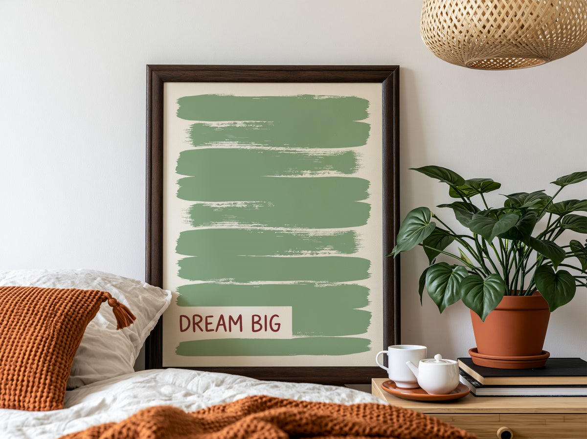 Motivational poster with dark Dream Big text over layered sage green brushstroke background.
