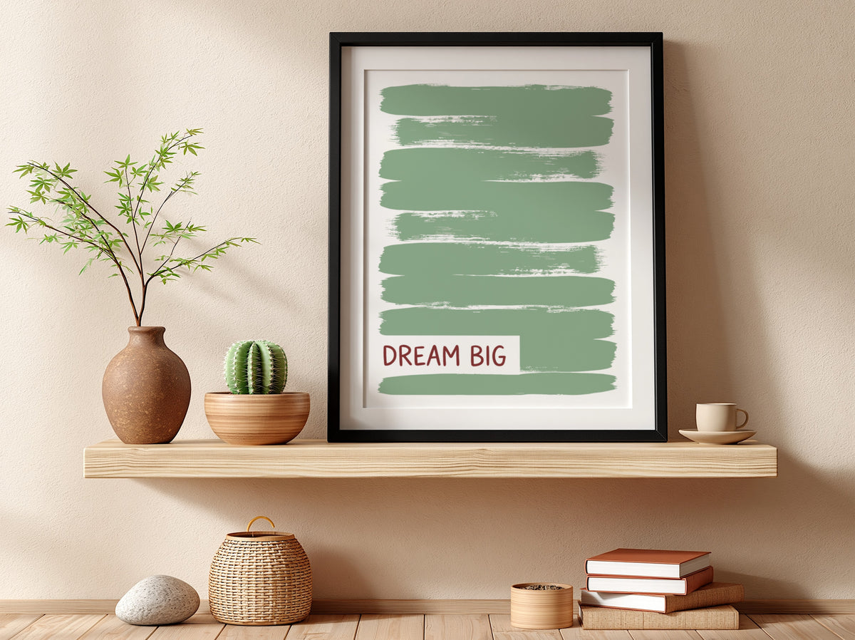 Motivational poster with dark Dream Big text over layered sage green brushstroke background.