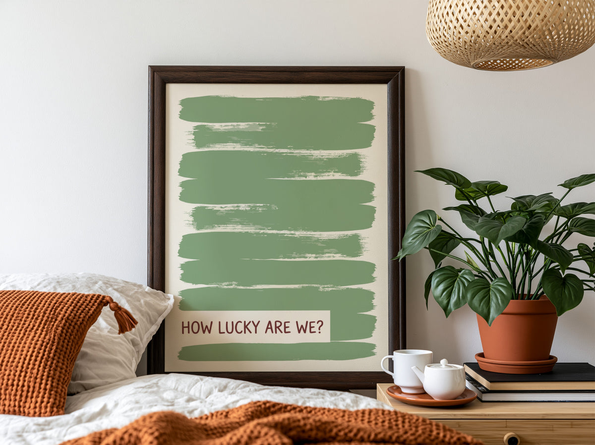 Motivational poster with sage green brushstrokes and the text How Lucky Are We displayed.