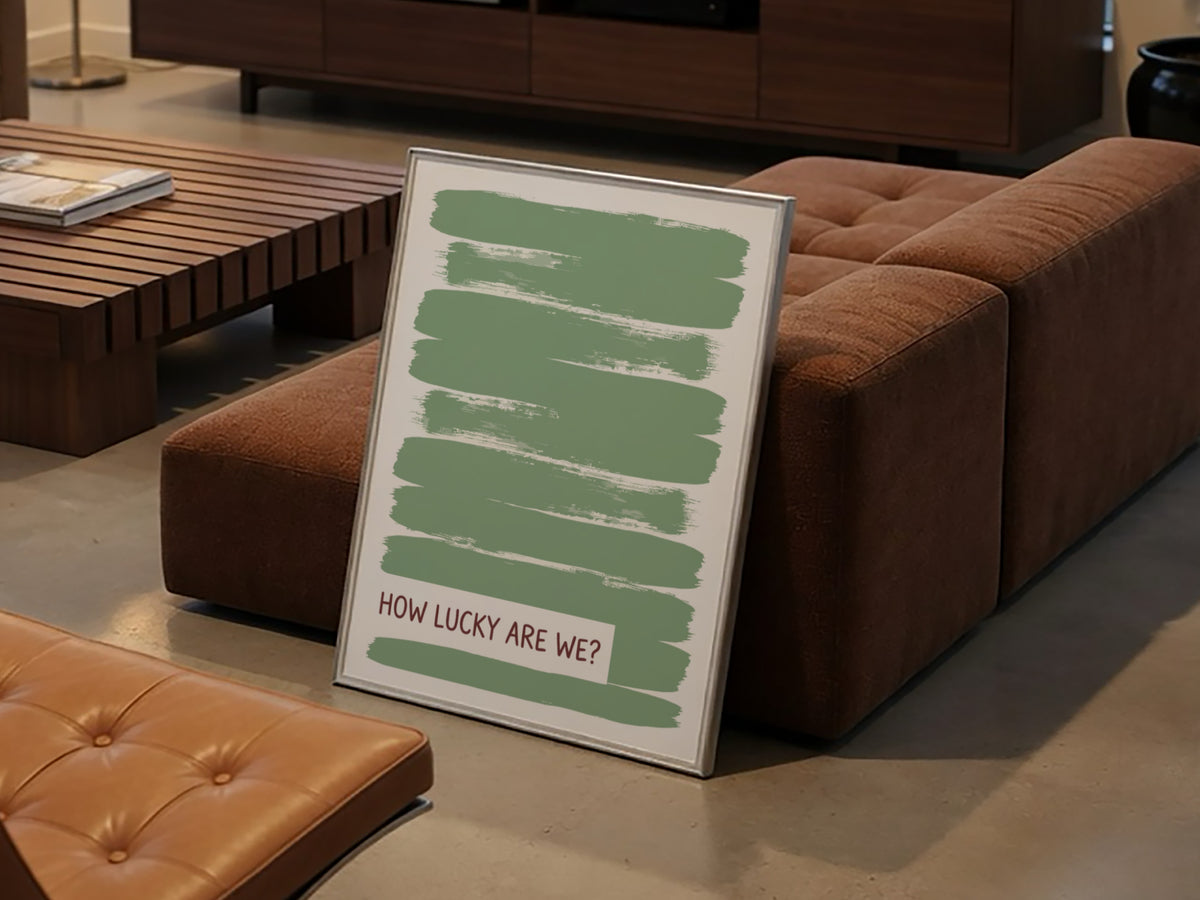 Motivational poster with sage green brushstrokes and the text How Lucky Are We displayed.