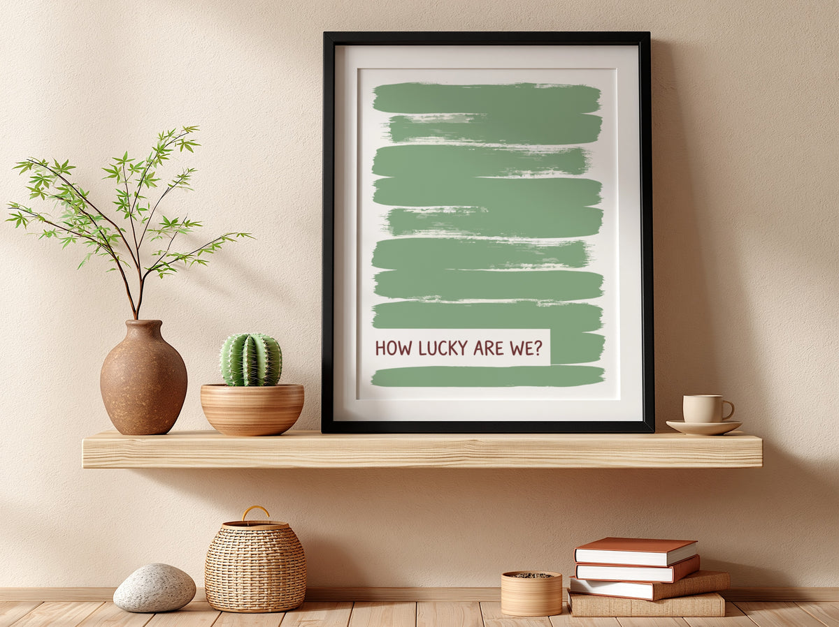 Motivational poster with sage green brushstrokes and the text How Lucky Are We displayed.
