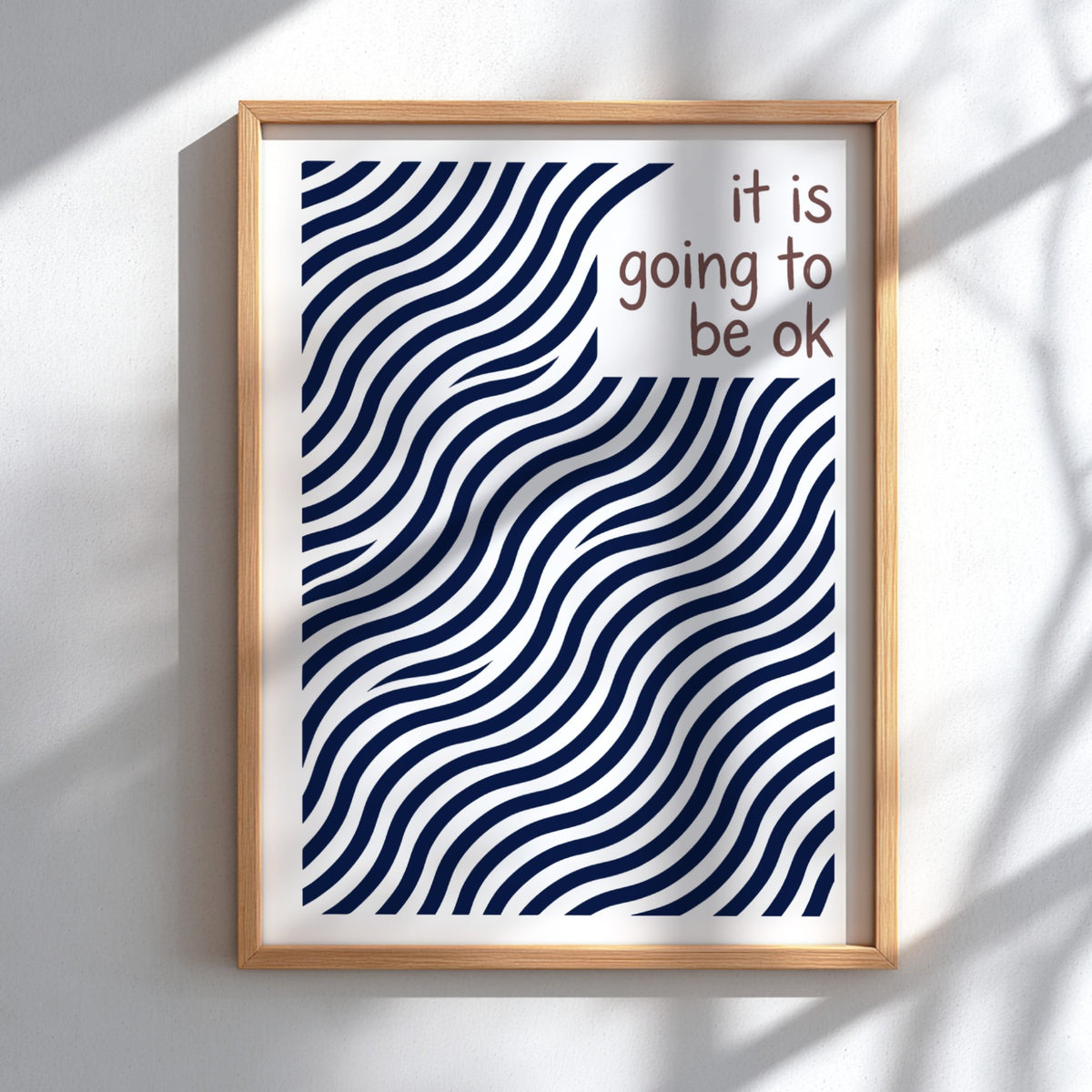 Motivational poster with navy blue wavy lines and the text it is going to be ok.
