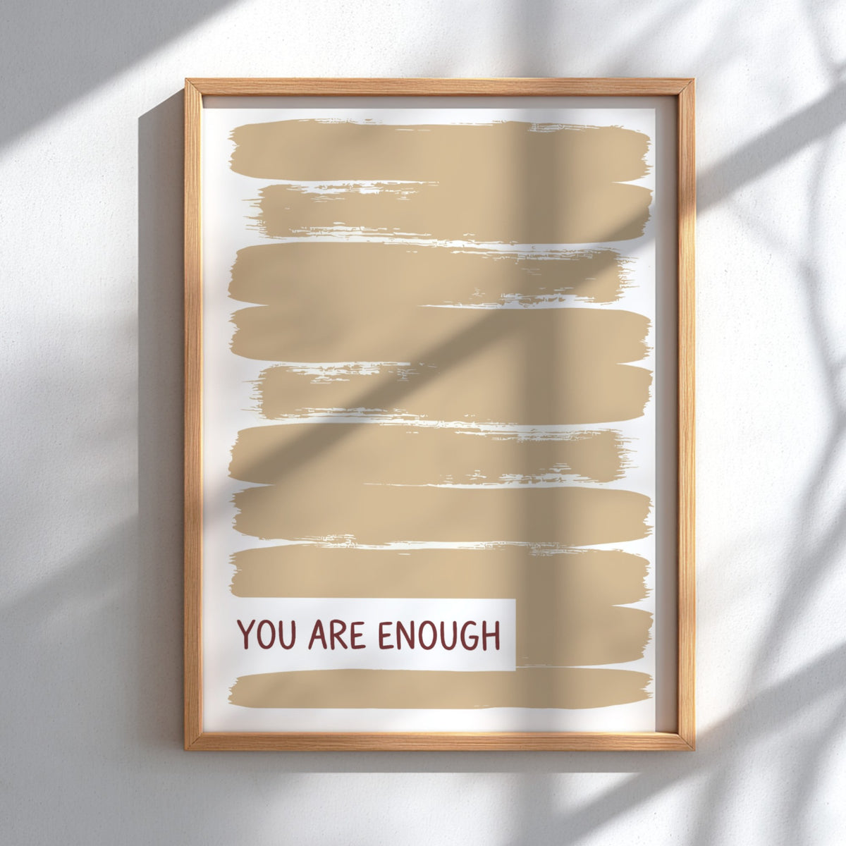Motivational poster with warm taupe brushstrokes and the text You Are Enough displayed.