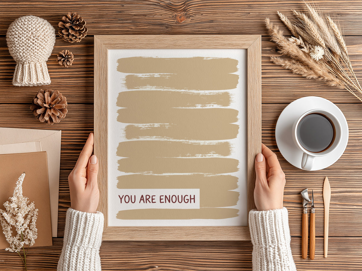 Motivational poster with warm taupe brushstrokes and the text You Are Enough displayed.