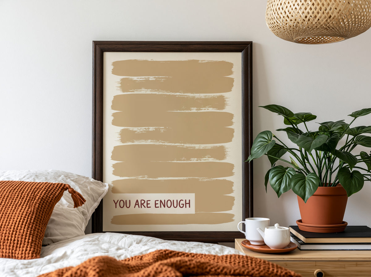 Motivational poster with warm taupe brushstrokes and the text You Are Enough displayed.