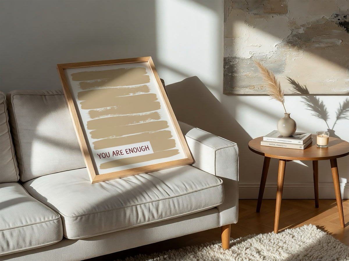 Motivational poster with warm taupe brushstrokes and the text You Are Enough displayed.