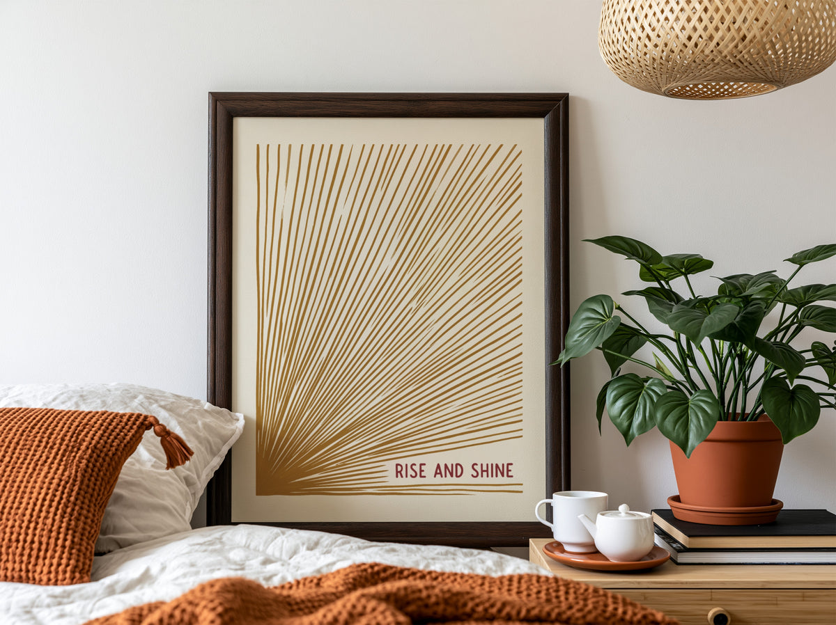 Motivational poster with golden sunburst lines on cream background and Rise and Shine text