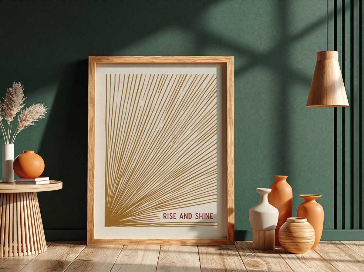 Motivational poster with golden sunburst lines on cream background and Rise and Shine text