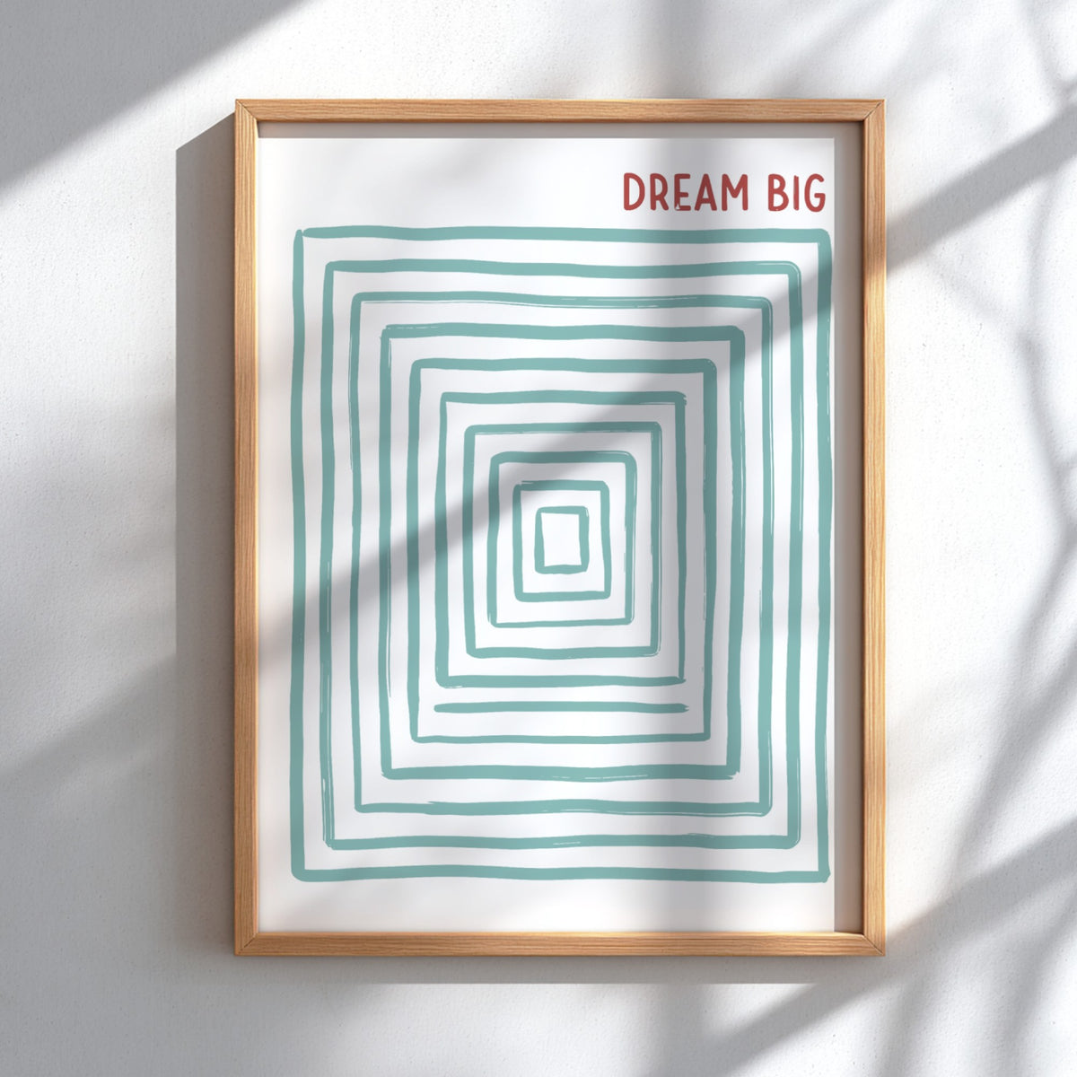 Motivational poster featuring the text Dream Big with concentric sage green rectangular lines.