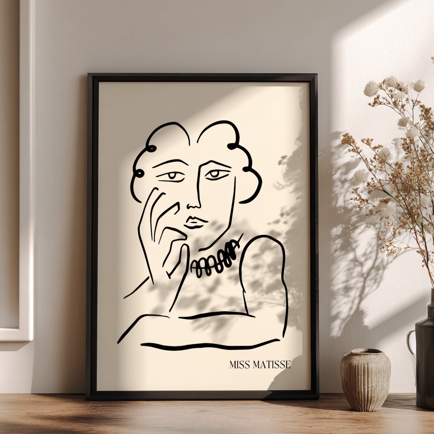 Miss Matisse line art poster featuring a portrait with a beaded necklace on a cream background.
