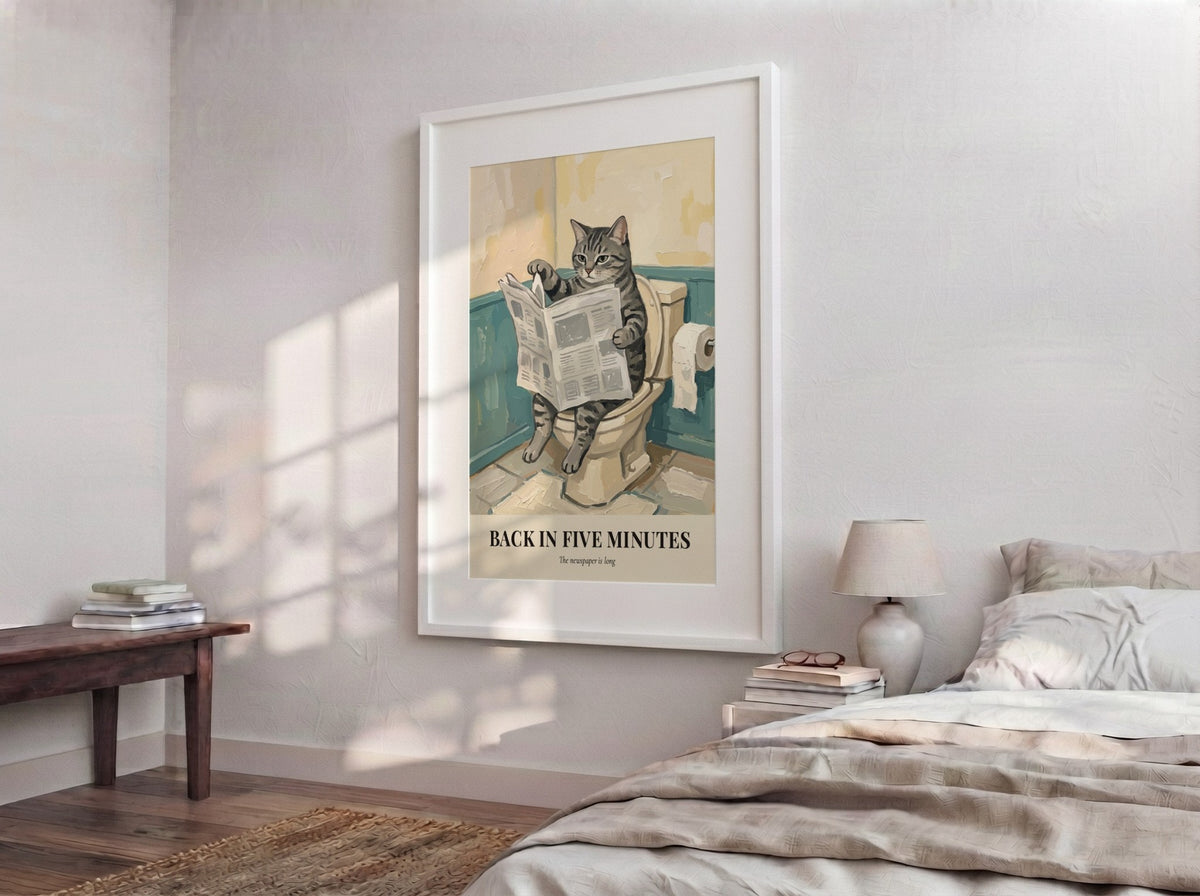 Poster of a tabby cat reading a newspaper while sitting on a toilet