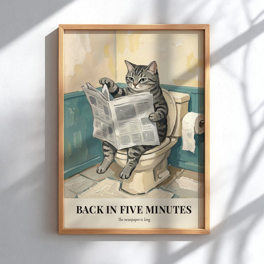 Poster of a tabby cat reading a newspaper while sitting on a toilet