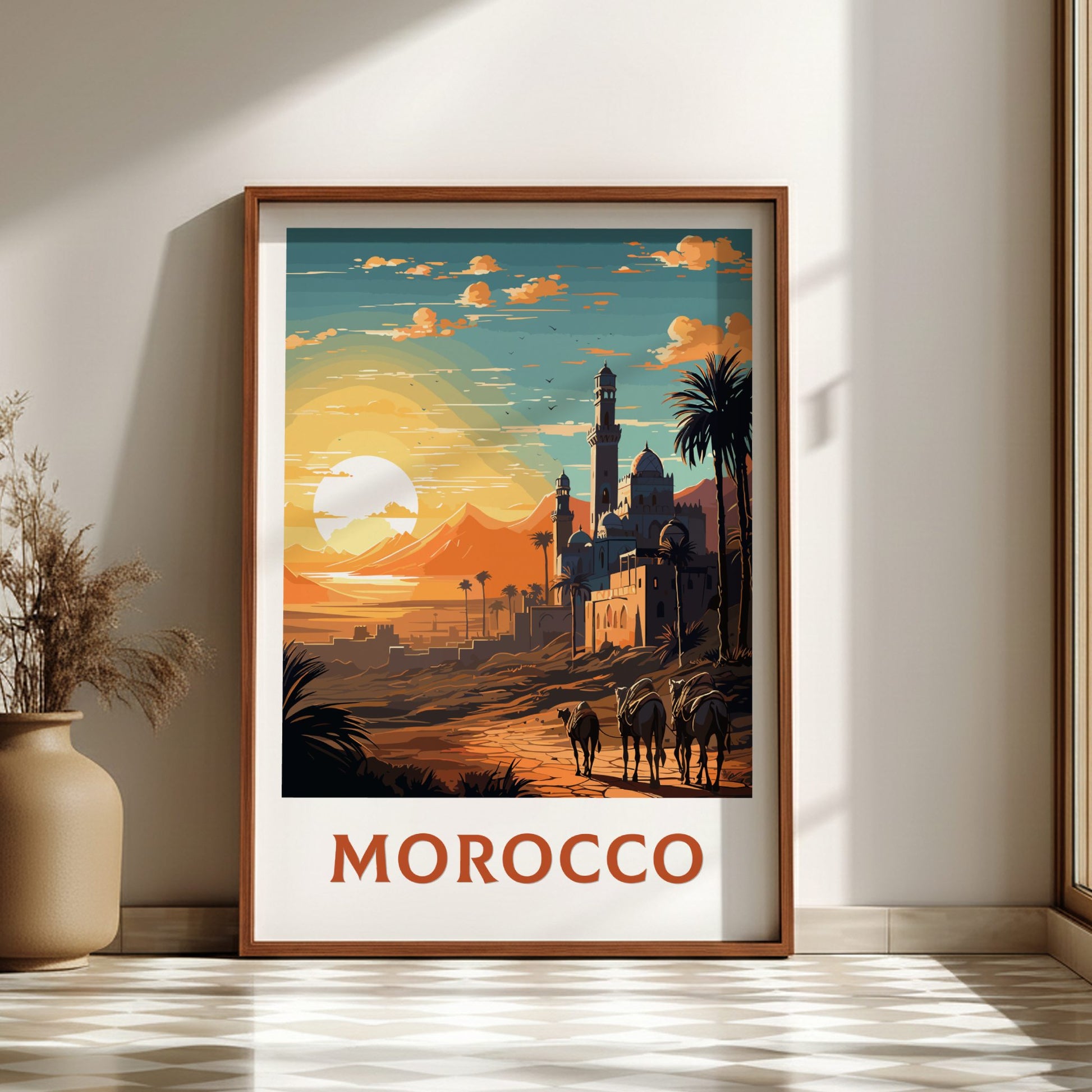 Framed artwork of a Moroccan landscape with sunset and architecture, titled 'Morocco'.