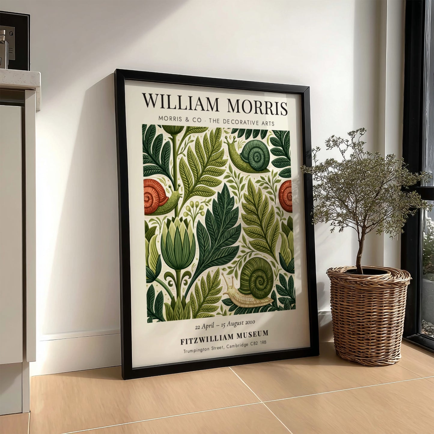 William Morris poster featuring intricate foliage and snails in green tones, decorative arts style