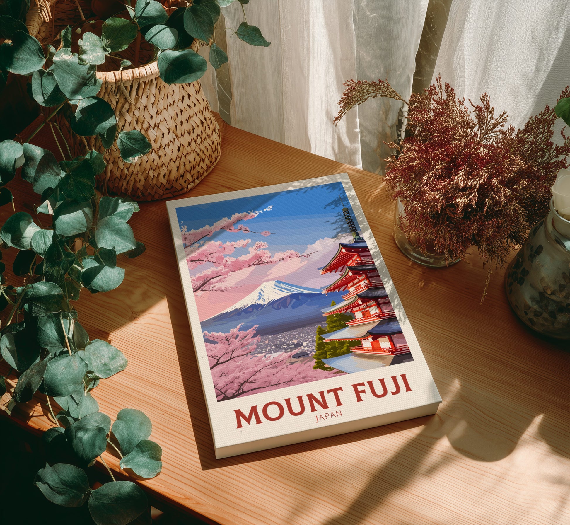 Canvas'Mount Fuji Japan' on a wooden table with plants