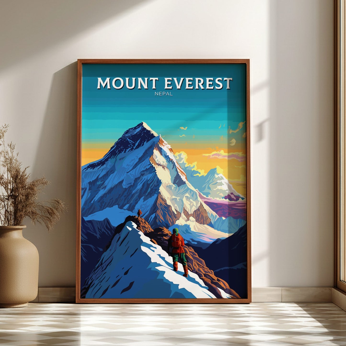 Framed poster of Mount Everest with a climber on a snowy peak, displayed in a room.