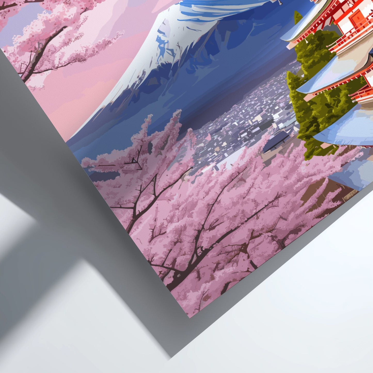 Framed artwork with cherry blossoms and a traditional building.