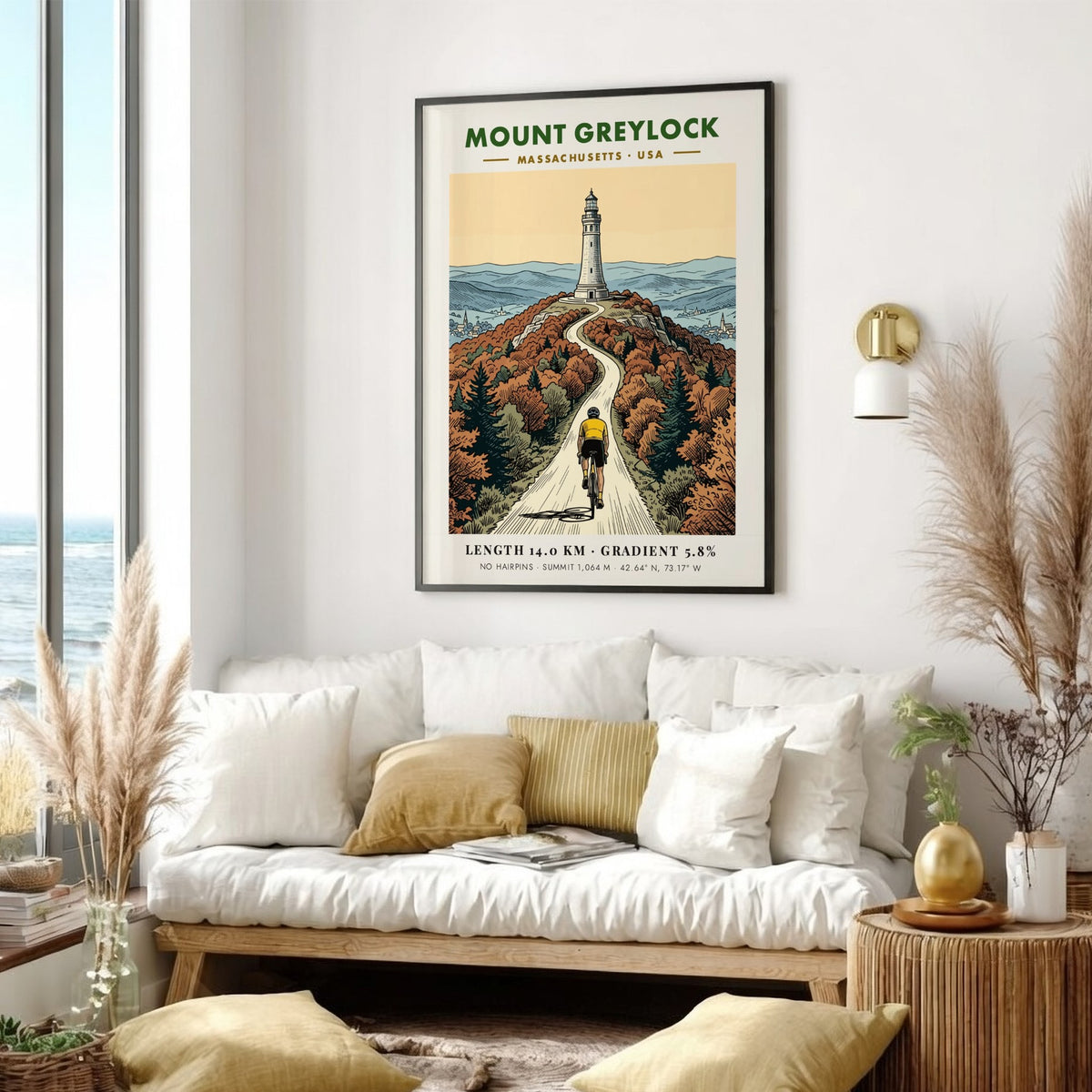 Poster showing a cyclist riding toward the Mount Greylock lighthouse in Massachusetts autumn colors.