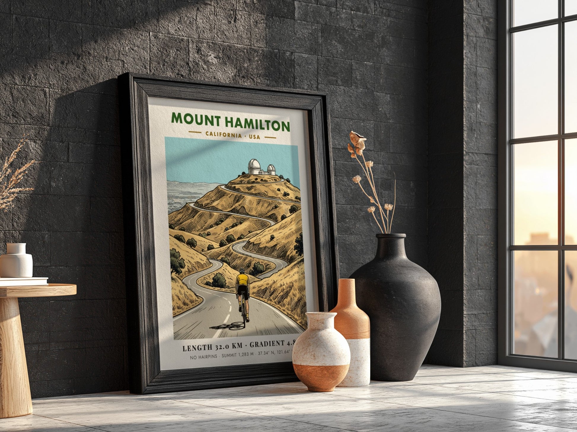 Poster of a cyclist climbing a winding mountain road toward Mount Hamilton observatory domes.